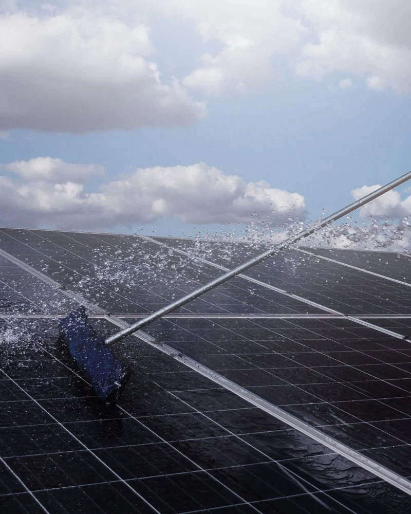 Solar panels under a cloudy sky